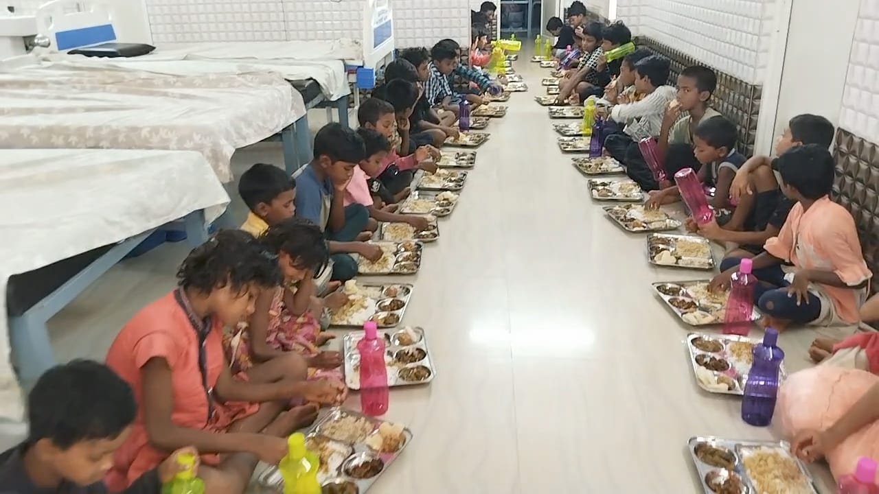 Children having meals at the foundation